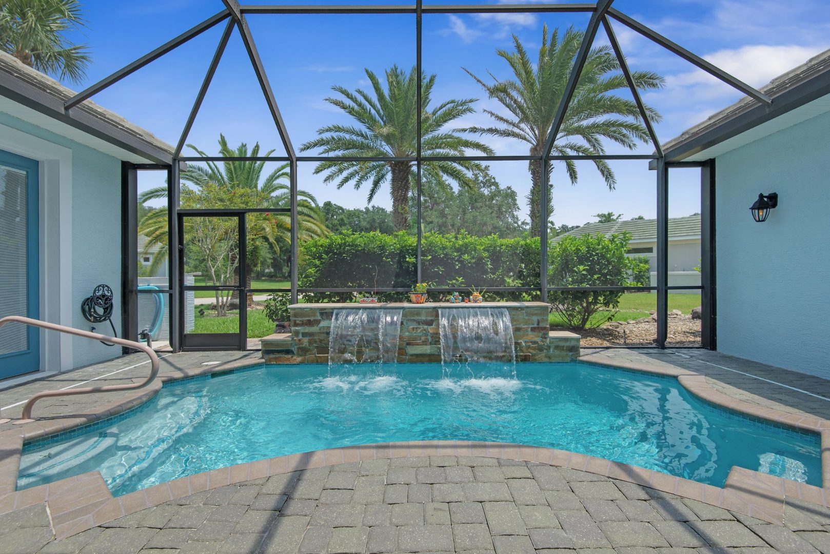 Courtyard pool with new waterfall wall
